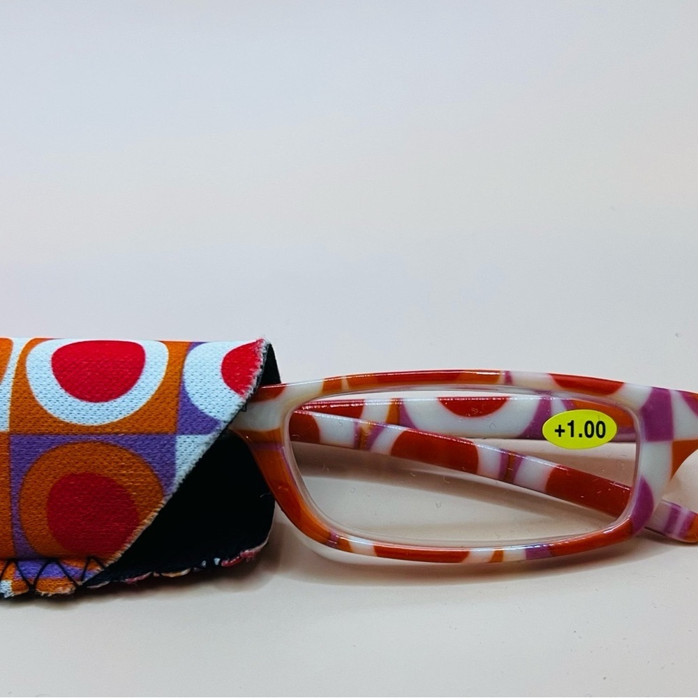 NEW GEOMETRIC NARROW READERS. FEATURES MULTI-COLOR DESIGN WITH MATCHING CASE